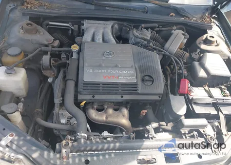 2000 Toyota Avalon Xl z USA, uszkodzony, nr VIN 4T1BF28B5YU031611